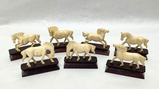 Ivory Horses on Wood Stands